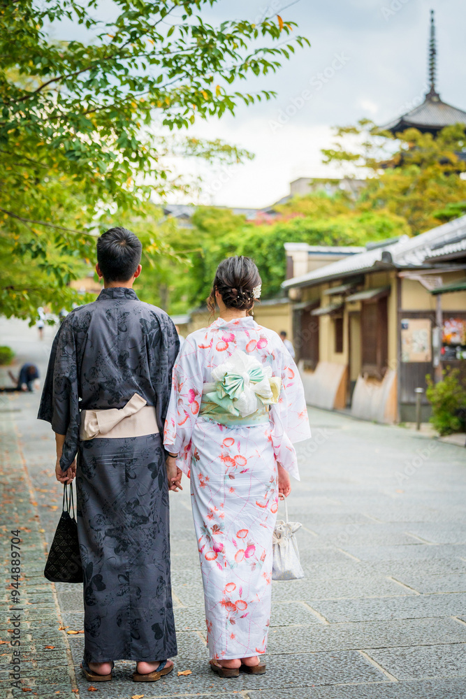 A couple wearing Japanese Yukata back view. Kyoto, Japan. A couple wearing Japanese Yukata back view. Kyoto, Japan.