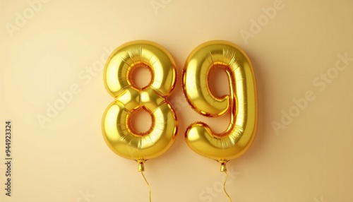 Banner with number 89 golden balloon with copy space. Eighty-ninth birthday celebration on a solid color background.