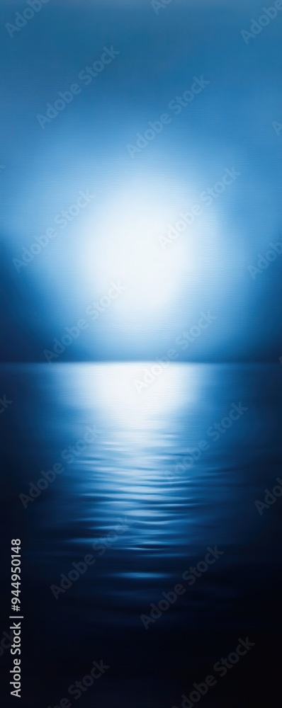 Stunning abstract morning sunrise over calm ocean creates a tranquil and serene atmosphere in shades of blue, ideal for backgrounds and designs. Stunning abstract morning sunrise over calm ocean creates a tranquil and serene atmosphere in shades of blue, ideal for backgrounds and designs.