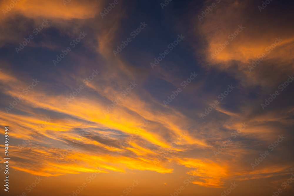 Fototapeta premium Enjoy a panoramic view of the skyline. The sun rises in the morning sky with colorful clouds. and beautiful cloud patterns In the soft light of the morning 