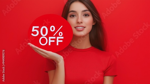 Woman holding sign with text "50% OFF". Sales and discounts season, black friday and online shopping