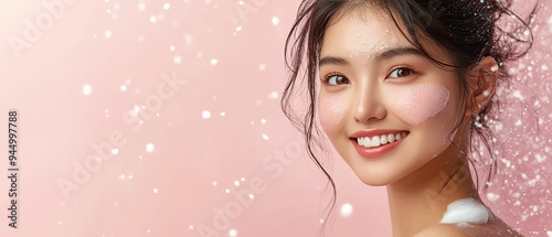 Asian woman with a beauty smile applying moisturizer to her skin, arm and shoulder, postshower skin care routine photo