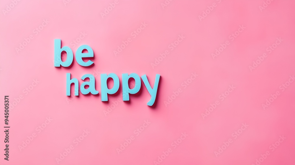 a pink wall with the words be happy written in blue on it a pink wall with the words be happy written in blue on it