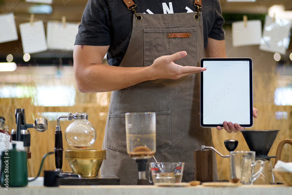 barista is preparing equipment for making coffee. barista is preparing equipment for making coffee.
