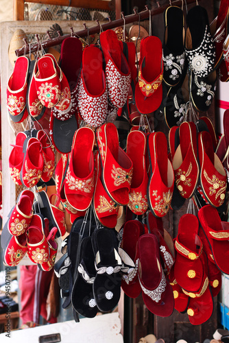 Nepali Traditional wedding red shoes in the market.Kaapa Lnaka in the Newari language. Nepali Festival shoes. photo