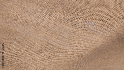 Close-up shot to reveal texture of sack.  Simple background or texture. Sackcloth or burlap texture. Closeup of natural sackcloth, canvas, fabric, jute, pattern for background