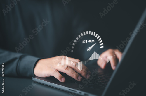 Speed test for internet network connection. Man using a laptop computer to benchmark check wireless networking or 5G cellular Mbps or Gbps speed quality. WiFi 7 download or upload transfer rate.