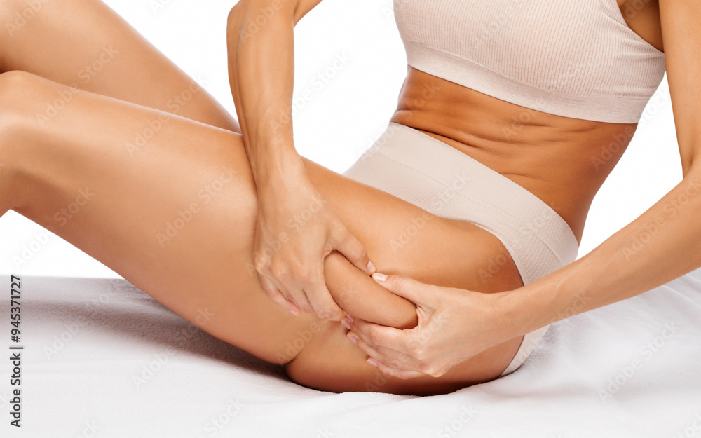 Fat woman with cellulite on her legs. Obese woman in white underwear.Overweight treatment. Fat woman with cellulite on her legs. Obese woman in white underwear.Overweight treatment.