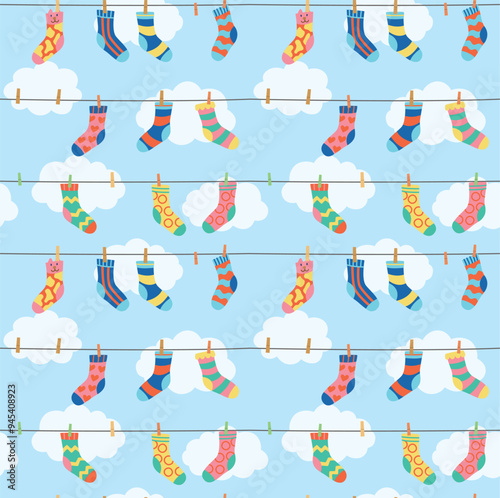 Seamless colorful pattern with various socks that are dried on clothespins and clouds. Cute cartoon vector background	