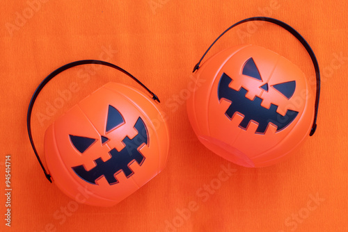 Halloween candy pumpkins on an orange background