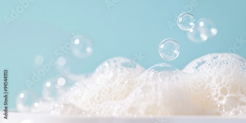 Gentle Foam and Bubbles on Soft Skin Texture with Light Blue Background. Minimalist Color Block Design Style Close-up.