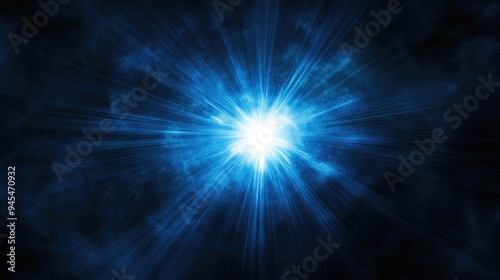 Blue abstract lens flare light effect on a dark backdrop Radiant star