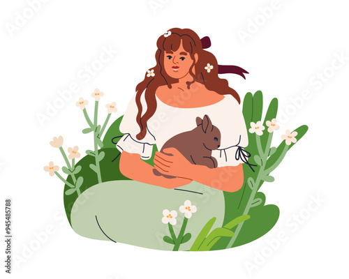 Woman holding cute rabbit in hands. Pretty young girl caring for bunny in mea...