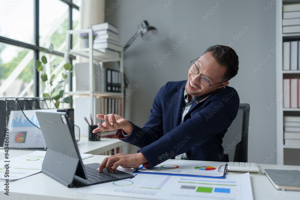 Asian businessman use smartphones to communicate online. Office worker making financial business call Marketing, talk about work, contact with customers, startup business ideas. Asian businessman use smartphones to communicate online. Office worker making financial business call Marketing, talk about work, contact with customers, startup business ideas.
