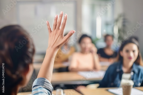 Businessman asking a question on a meeting in the office. Entrepreneur raising his hand to ask a question on a business meeting in the office.