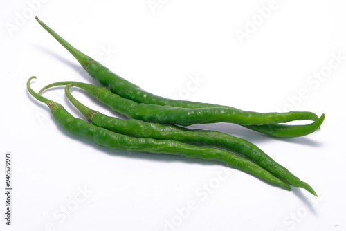 Fototapeta Naklejka Na Ścianę i Meble -  long green chilies on a white background
