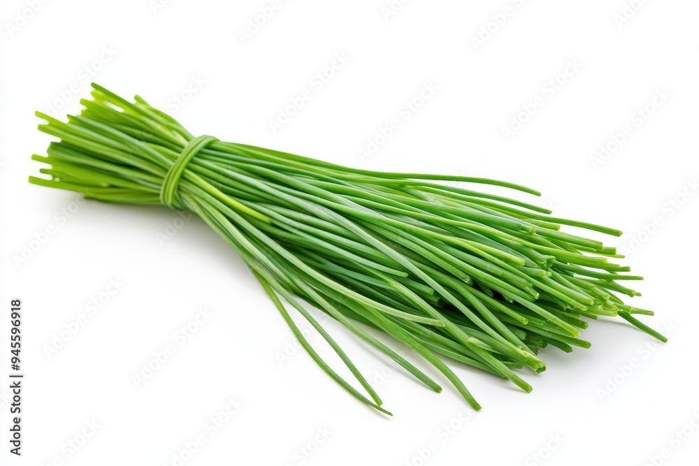 A bundle of fresh green chives, commonly used as a culinary herb. A bundle of fresh green chives, commonly used as a culinary herb.