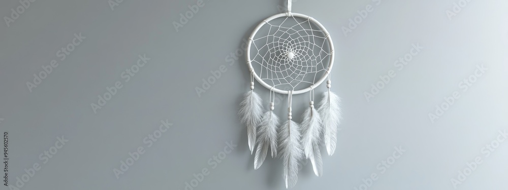 Obraz premium 3D rendering of a white dreamcatcher against a gray background for interior decoration