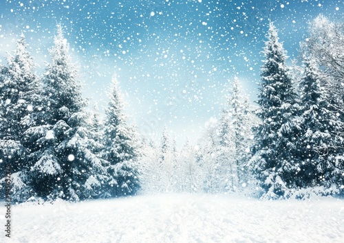 Snowy pine trees in a winter landscape with falling snowflakes and a blue sky Generative AI