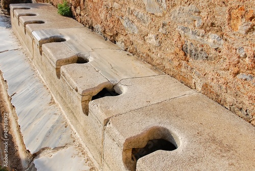 Quadro su tela Public toilets, latrines in the ancient Greek city of Ephesus