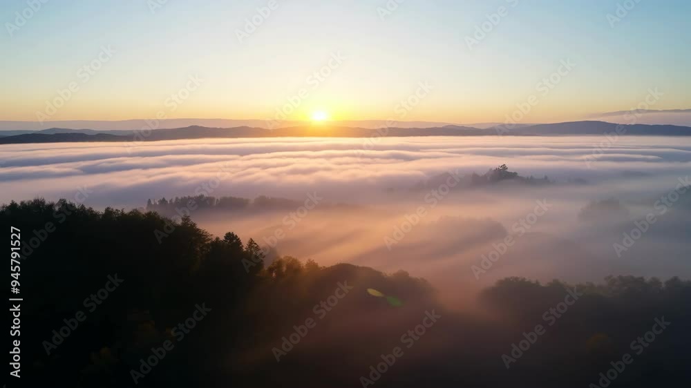 Foggy Sunrise: Light Breaking Through Clouds and Mist Foggy Sunrise: Light Breaking Through Clouds and Mist