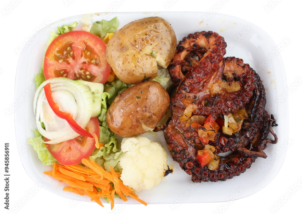 Grilled octopus with potatoes and vegetables isolated Grilled octopus with potatoes and vegetables isolated