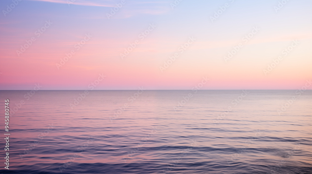 Fototapeta premium Vibrant Twilight Over Still Ocean With Reflective Waters and Gradient Sky