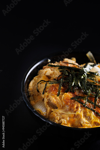 Katsudon with rice japanese food isolate in black background