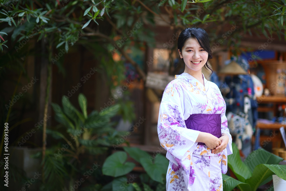 Portrait of beautiful young Japanese girl in Japanese kimono Portrait of beautiful young Japanese girl in Japanese kimono