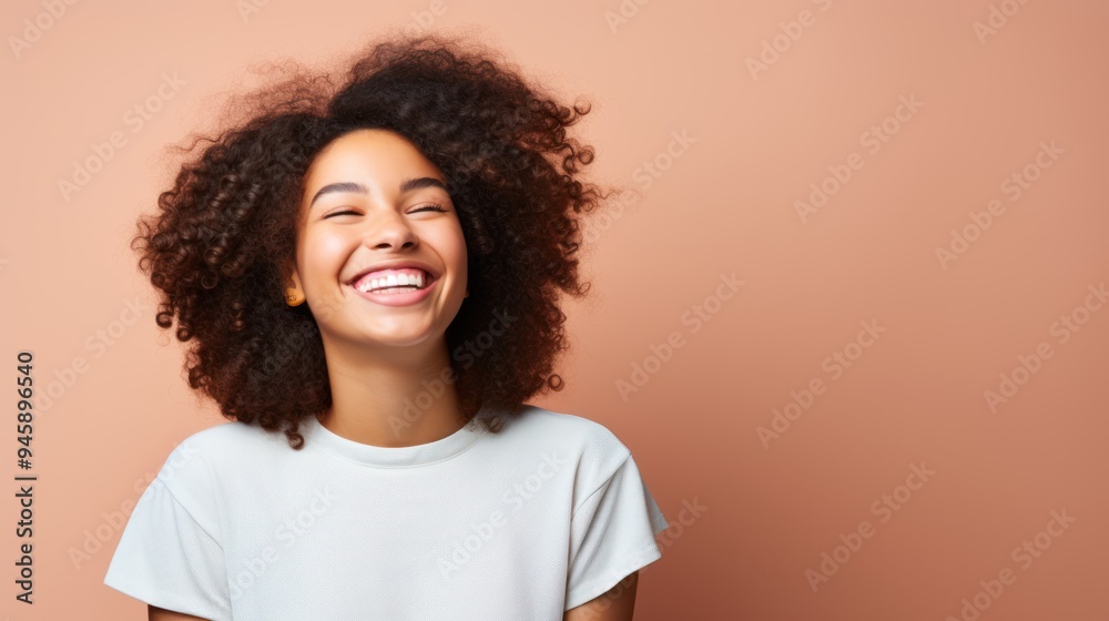 Smiling teenage girl with a relaxed pose, 