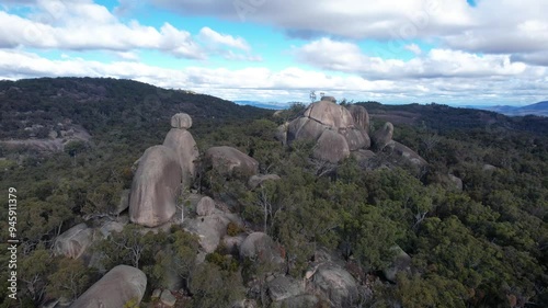 Aerial view of Girraween National Park showcasing The Sphinx and Turtle Rock among rugged mountains and serene forests, Stanthorpe, Australia. photo