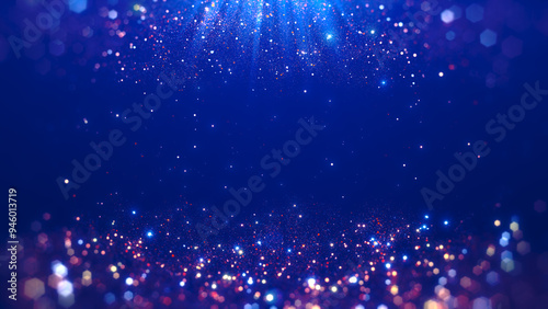 Bright dark blue abstract background with sparkling bokeh effect and light particles of different sizes and colors.