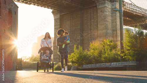 Photography Family Day Out In New York City With Two Mums Walking By Brooklyn Bridge With Ch