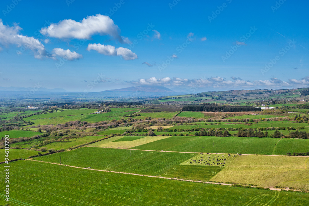 Green meadows of Ireland with mountain views of Killarney, Co. Kerry