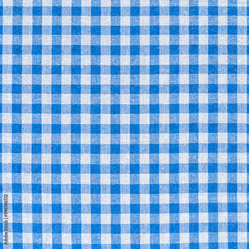 Cotton fabric background. Blue and white checkered tablecloth. Fabric texture.