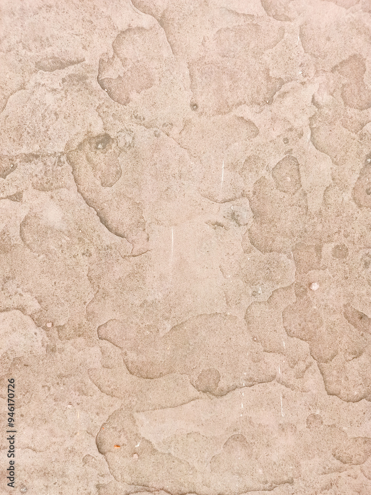 Texture of old rustic wall covered with beige stucco Texture of old rustic wall covered with beige stucco
