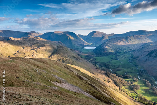 Sun and shadows in the valley in the mountains photo