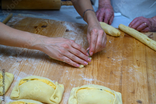 Traditional Cypriot Flaouna delicious Greek Easter Cheese Bread. Flaounes are traditionally prepared for Easter by Orthodox Cypriots. photo