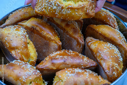 Traditional Cypriot Flaouna delicious Greek Easter Cheese Bread. Flaounes are traditionally prepared for Easter by Orthodox Cypriots. photo