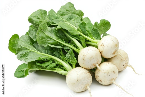 A bunch of fresh, white turnips with green leaves, ready for cooking or salad preparation.