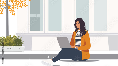 Focused Young Business Woman Working on Laptop at Table