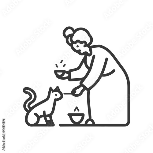 Elderly Woman Feeding a Cat from a Bowl