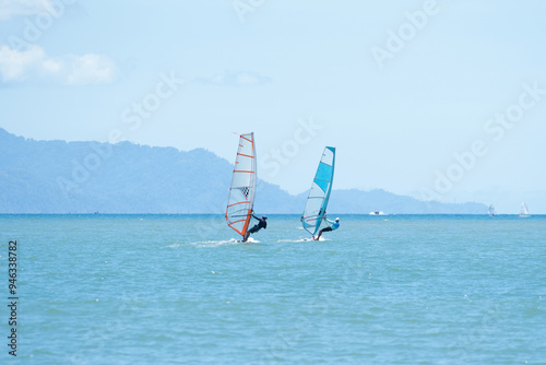 Windsurfers having fun in the ocean