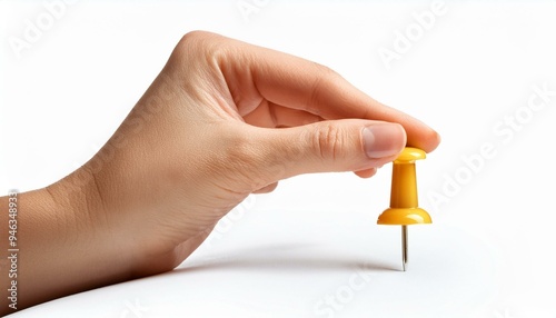 a push pin on hand isolated on white background.