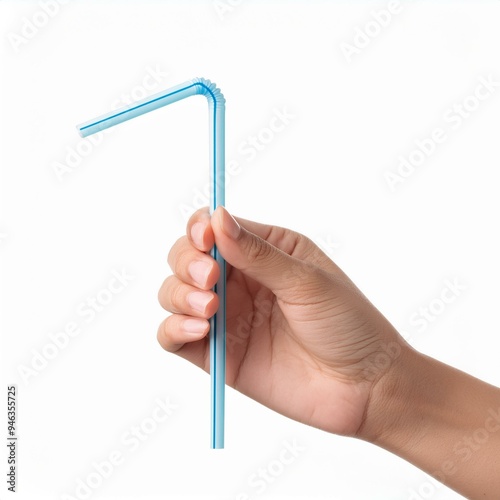 hand holding drinking straw isolated on white background. photo