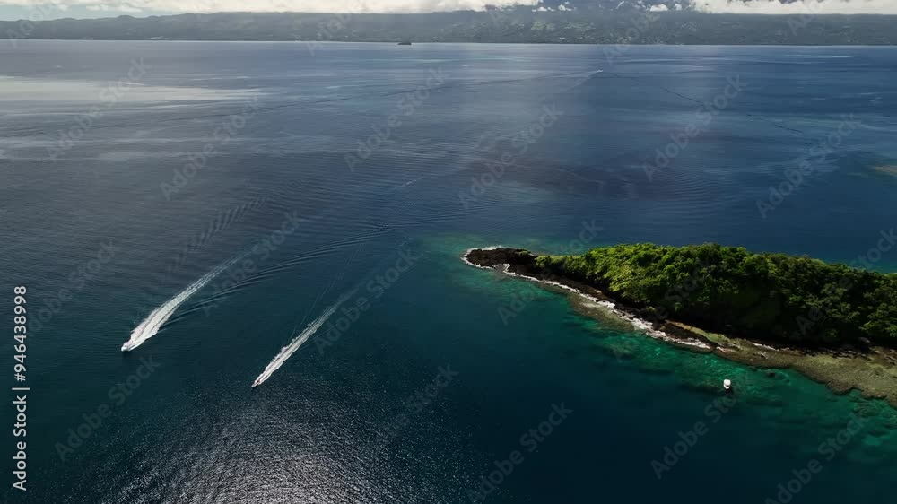 Aerial view of a beautiful Fiji with a boat in the turquoise ocean, Fiji. Aerial view of a beautiful Fiji with a boat in the turquoise ocean, Fiji.
