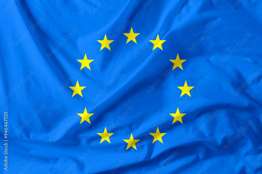 Flag of European Union, blue fabric with circle of stars Flag of European Union, blue fabric with circle of stars