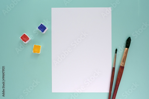 mock-up white paper blank watercolour painting with brushes