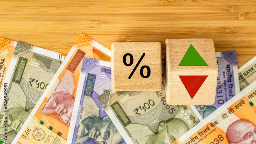 Wooden blocks with bank interest rate percent of bank with Indian rupees, Financial analysis, crisis project or economic growth concept. India money, close up, Flat lay background