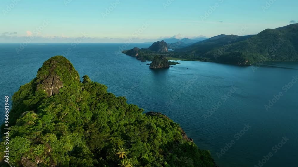 Aerial view of a picturesque archipelago with lush greenery and serene sea stacks, New Caledonia. Aerial view of a picturesque archipelago with lush greenery and serene sea stacks, New Caledonia.